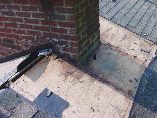 Plywood damage around chimney Plywood damage around chimney